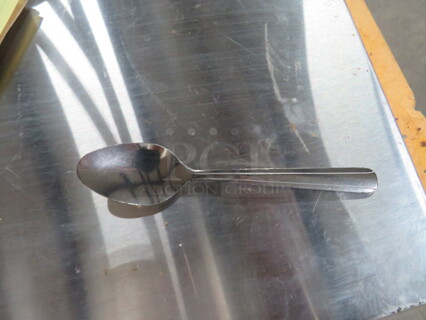 One Dozen NEW Dominion Teaspoons. 