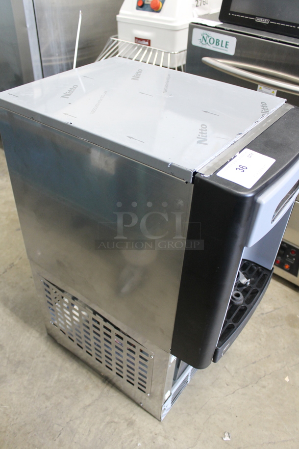 BRAND NEW SCRATCH AND DENT! 2023 Follett 7UD100A Stainless Steel Commercial Countertop Nugget Ice and Water Dispenser. 115 Volts, 1 Phase.  - Image 6 of 6