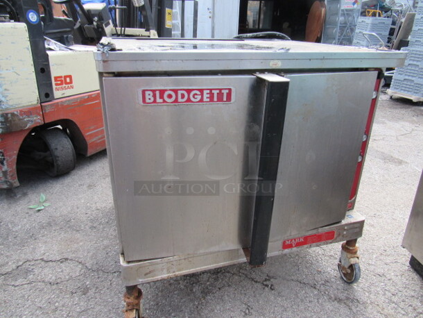 One Blodgett Mark V Electric Full Size Convection Oven With 4 Racks.208-220Volt Or 230-240 Volt. 1 Or 3 Phase. 38X38X38
