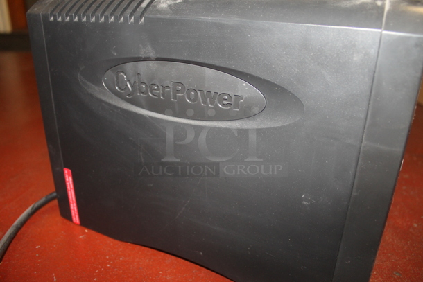 ALL ONE MONEY! MEGA LOT of Various Items Including Humane Metal Trap, Cardboard Boxes, CyberPower and Hammer. BUYER MUST REMOVE. - Image 6 of 6