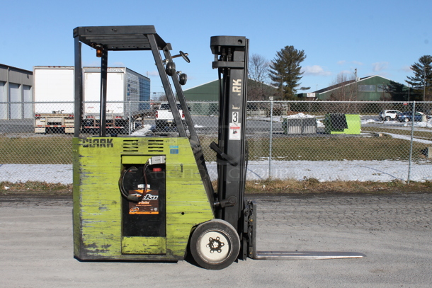 Clark ESMII-25 Metal Industrial 5,000 Pound Capacity Electric Powered Rider Forklift w/ Tennant 24026-18M600B23 Battery Charger. Hours 3,377. Forklift is Tested and Working!