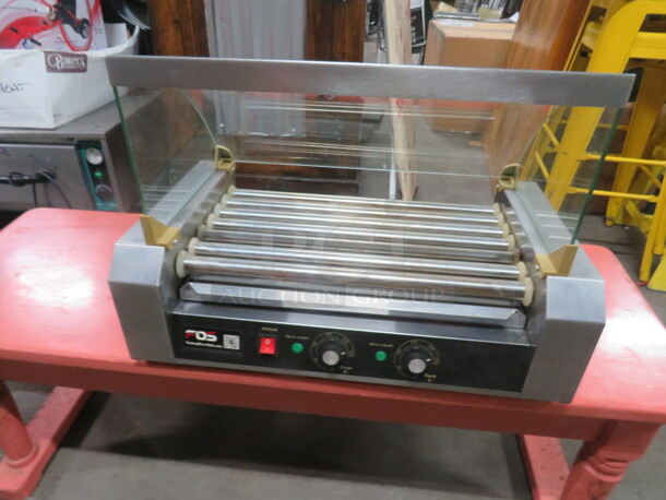 One WORKING CW Hot Dog Roller With Sneeze Guard. Model# 
EP19235. 110 Volt.  - Image 1 of 3