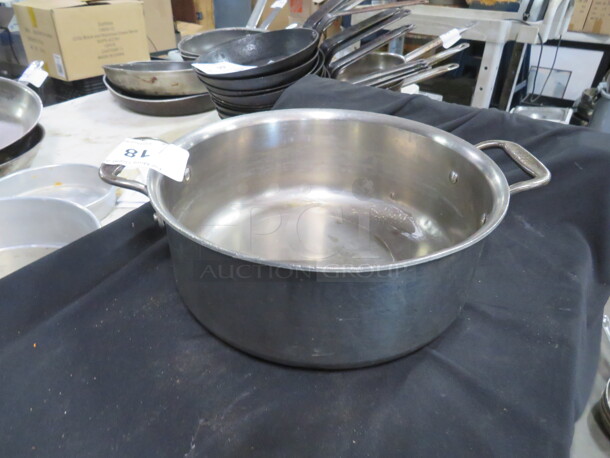 One Stainless Steel Stock Pot. 11X4