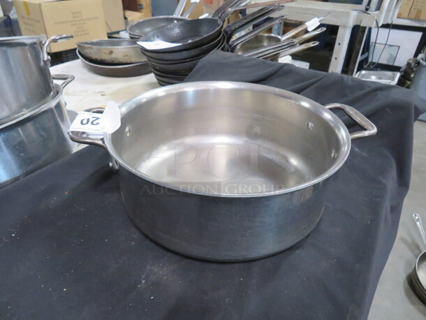 One Stainless Steel Stock Pot. 11X4
