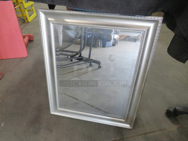 One 24.5X21 Framed Mirror. - Image 1 of 1