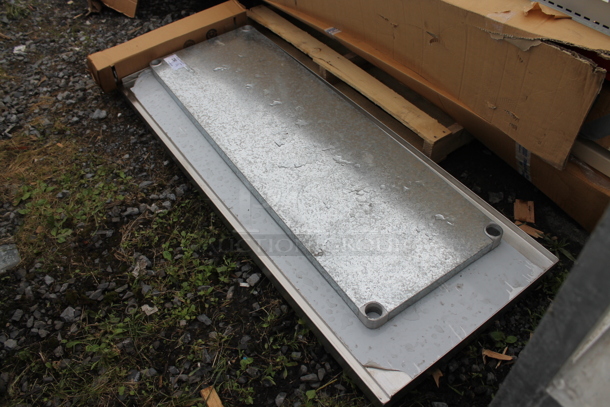 BRAND NEW SCRATCH AND DENT! Stainless Steel Tabletop w/ Metal Under Shelf and Legs. Includes 60.5x24 - Image 1 of 5