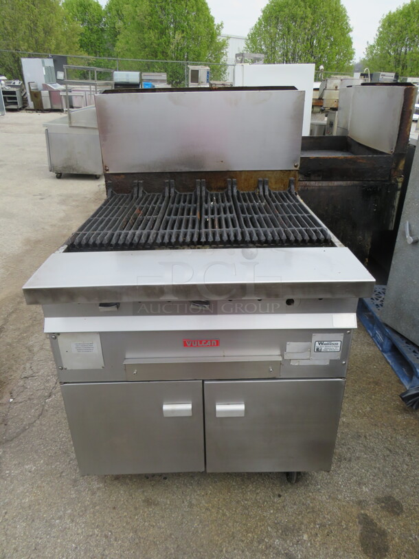 One WORKING Vulcan Natural Gas Charbroiler Range On Casters. Model# GHCB34S. 34X39X54