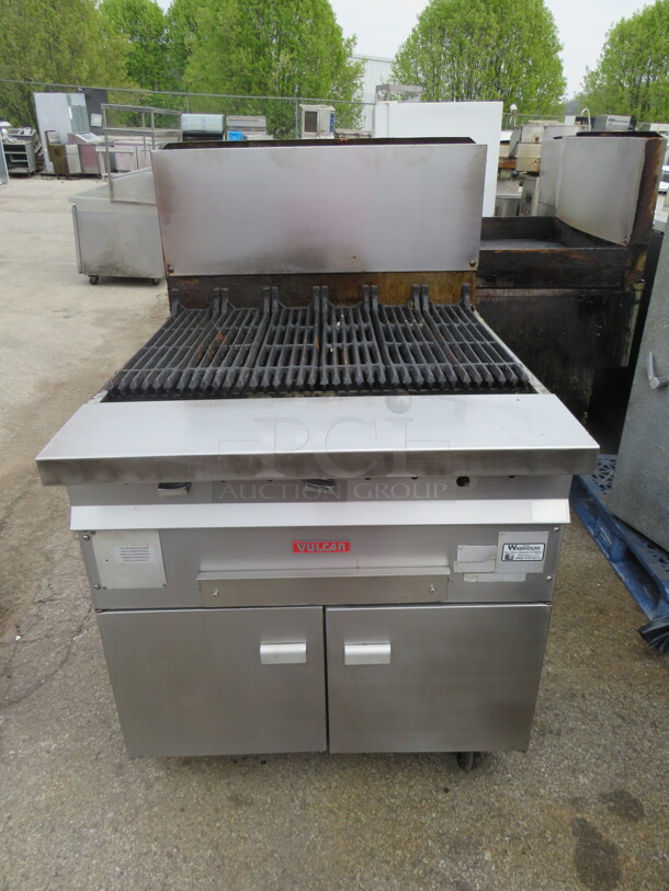 One WORKING Vulcan Natural Gas Charbroiler Range On Casters. Model# GHCB34S. 34X39X54 - Image 1 of 1