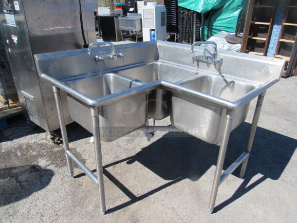 One Advance Tabco Stainless Steel Corner 3 Compartment Sink With Dual Faucets. 47X28X40. Middle Sink 20X20X12, 2 Sinks 16X20X12
