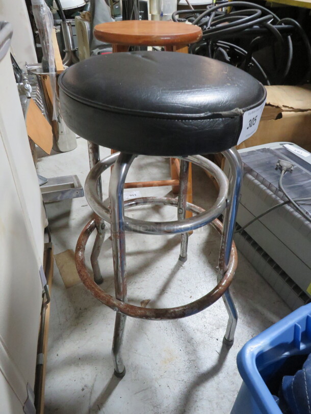 One Bar Stool With A Black Cushioned Seat. - Image 1 of 1