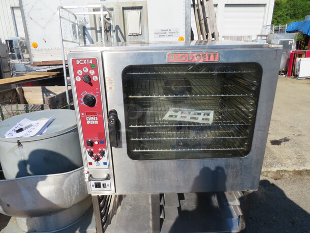 One Blodgett Full Size Electric Combi Oven With 5 Racks, And Manuals, On Stand. Model# BCX-14E. 208 Volt. 3 Phase. 40X41X56. $29,397.75. - Image 2 of 5