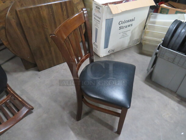 Wooden Chair With Black Cushioned Seat. Cushions Are Fair Condition. Some With Rips, Some Are Good. 4XBID - Image 2 of 3