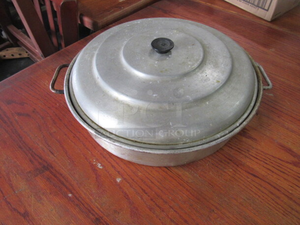 One 15 Inch Round Pan With Lid..  - Image 1 of 2