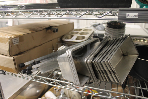 ALL ONE MONEY! Lot of Strainers, Stainless Steel Masher, Steel Drop In Bins, Hand Mixers, Small Steel Pot, Cuisinart Food Processor, Muffin Baking Sheets, Coffee Maker, Heart Shaped Wicker Basket, Salt And Pepper Shakers, Christmas Decorations, 2 Boxes Of NEC SP-32 Speakers AND MORE! Does Not Include Metro Shelf. - Image 10 of 12