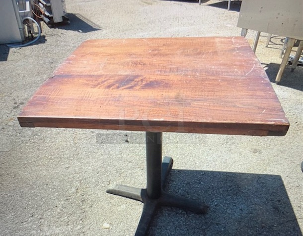 One Wooden Table Top On A Pedestal Base. 30X30X30
