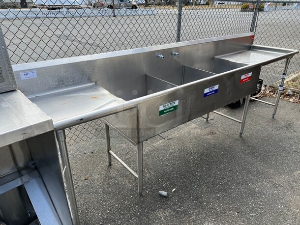Stainless Steel Commercial 3 Bay Sink w/ Dual Drainboards. 126x27x44. Bays 22x24x12. Left Drainboard 22x24x2. Right Drainboard 35x24x2 - Image 1 of 4