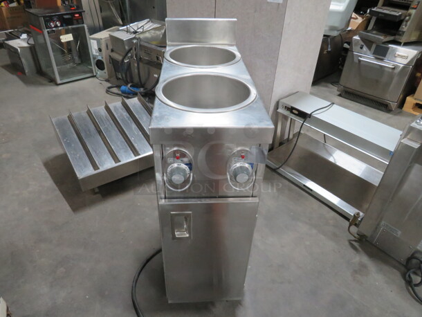 One Wells Stainless Steel Heated 2 Well Warmer With 1 Door Under Storage, On Casters. #SS10T. 120 Volt. 12X32X40