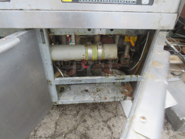 One Stainless Steel Natural Gas Triple FRYMASTER With 6 Baskets, And Filtration On Casters.  55.5X31X47. #HD50CSE - Image 3 of 4
