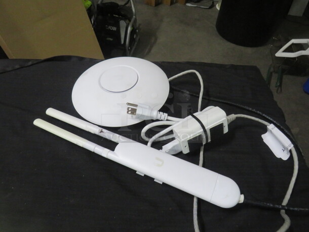 One Unifi Dual Band  Wifi 5 Access point.