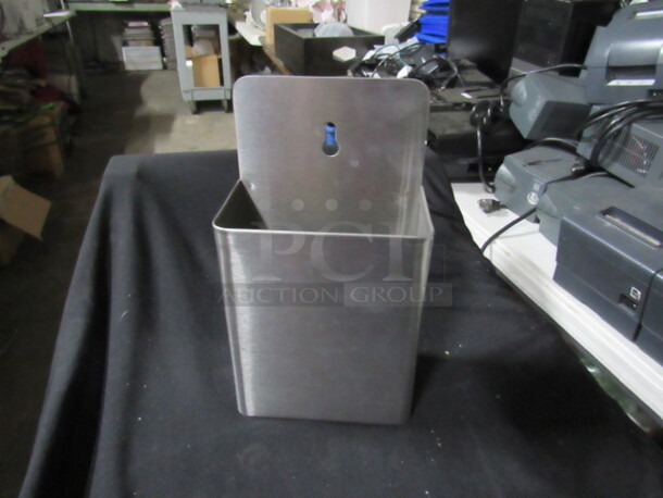 One Stainless Steel Holder. 5.5X3X9.5
