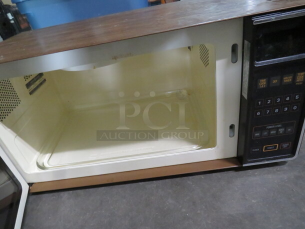 One General Electric Microwave. 23X12X12 - Image 2 of 2