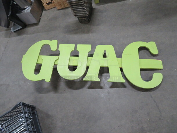 One Wooden GUAC Sign. 53X18 - Image 1 of 1