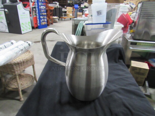 One Vollrath 100oz Stainless Steel Bell Pitcher. #82030