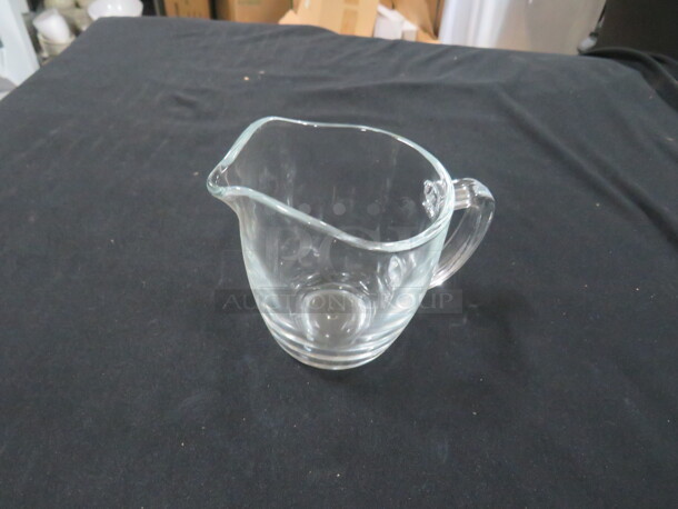 Clear Glass Creamer. 12XBID - Image 1 of 1