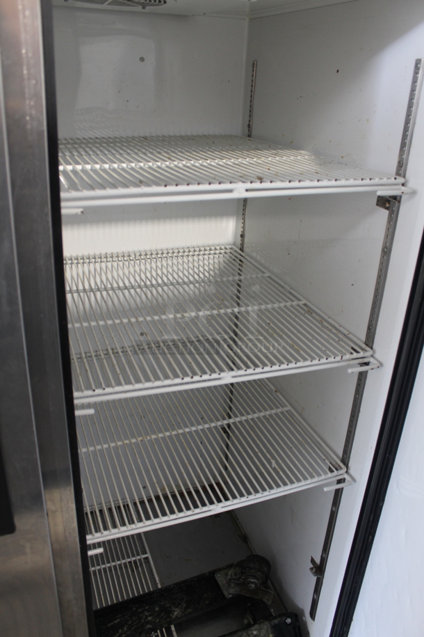 2013 True TG2R-2S ENERGY STAR Stainless Steel Commercial 2 Door Reach In Cooler w/ Poly Coated Racks on Commercial Casters. Tested and Working! - Image 6 of 7