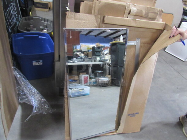 One Bobrick 18X36 Stainless Steel Framed Mirror. Model# B165