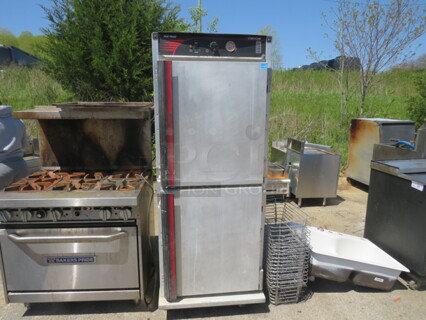 One Crescor Heated Holding Cabinet On Casters. Model# H137UA12C. 120 Volt. 28X4X73.5. $5434.50.