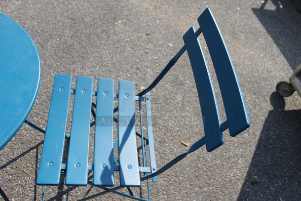 Blue Metal Round Folding Table and 2 Blue Metal Folding Chairs. 23.5x23.5x27.5, 16.5x14.5x32 - Image 4 of 5
