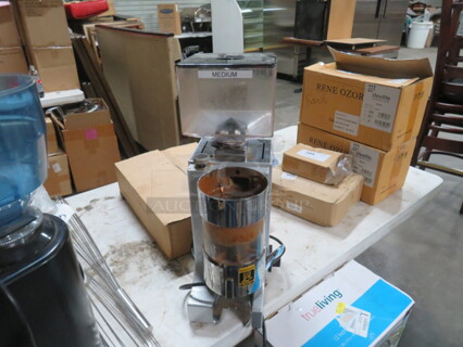 One Nuova Simonelli Grinder. 110-120 Volt. #MDLA. Missing 1 Lid.