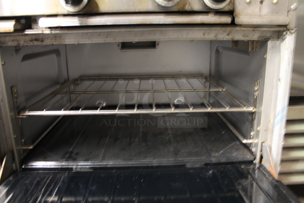 Garland X60-6G24RR Stainless Steel Commercial Natural Gas Powered 6 Burner Range w/ Flat Top Griddle, 2 Ovens, Over Shelf and Back Splash. - Image 5 of 9