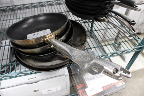 5 Various Metal Skillets. Includes 18x10x2. 5 Times Your Bid!