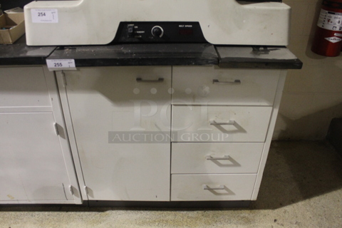 Counter w/ White Door and Drawers. BUYER MUST REMOVE.