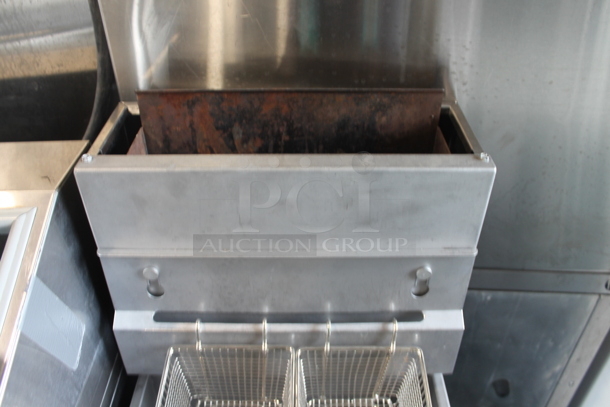 2019 Pitco Frialator 40D Stainless Steel Commercial Floor Style Natural Gas Powered Deep Fat Fryer w/ 2 Metal Fry Baskets on Commercial Casters. 107,000 BTU.  - Image 2 of 7