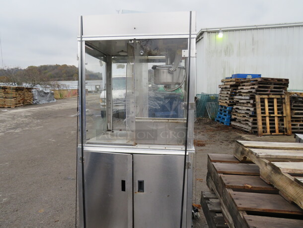 One Popcorn Machine With 2 Door Under Storage And Neon Popcorn Sign. Working When Removed. 36X28X74.5. NO SHIPPING