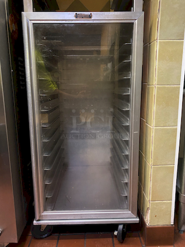 AMAZING! Lockwood CA72-RR12-6 Combination Open Air and Storage Display Cabinet With Removable Pan Support. 

9/10 Condition!

A versatile choice for cooling, storage and display with sheet pans
Construction: high tensile aluminum
Dimensions: 71-3/4"H x 22-7/8"W x 29-3/8"D
Center spacing: 3-1/4"
Pan capacity: supports (18) 18" wide pans (6 open air and 12 enclosed)
Casters: 5" non-marking swivel plate (2 with brakes)
Actual Weight: 120 lbs. - Image 3 of 8