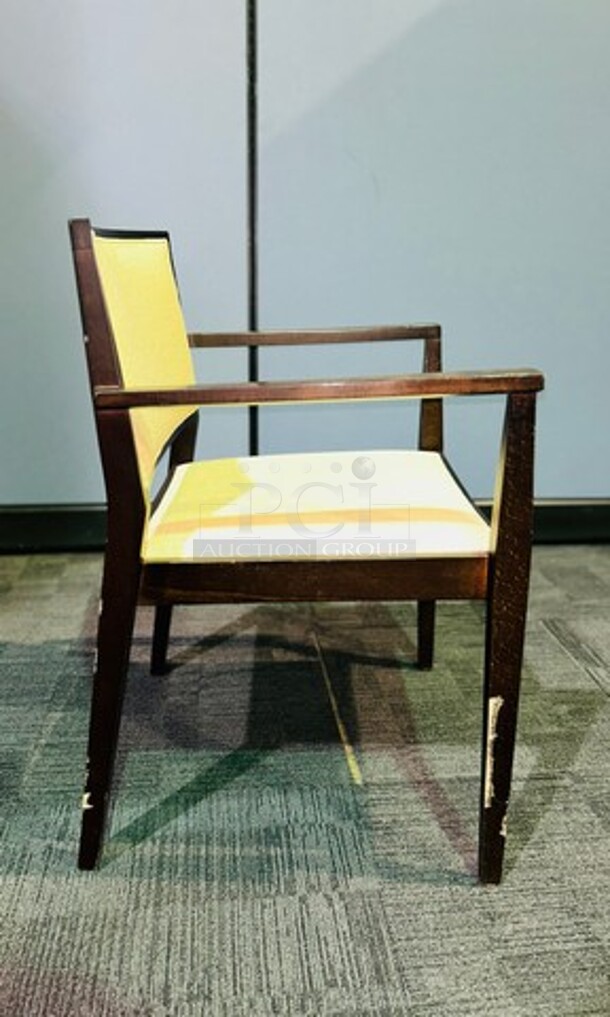 Guest chairs with armrests. Dark wooden framed and upholstered in a light cream fabric. Perfect for any waiting area, office or home. Minor scuffs and scratches (First picture shows sticker that can be removed). 31.5” H x 23” W x 18” D. BIDX3 - Image 1 of 2