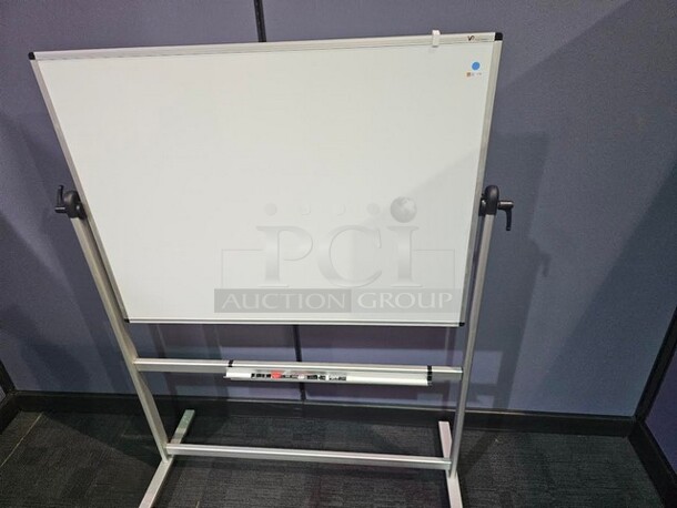 VizPro Dry erase whiteboard on wheels with silver metal framing. Double sided. In good used condition- not broken. 69"H x 52"W x 22"D - Image 2 of 3