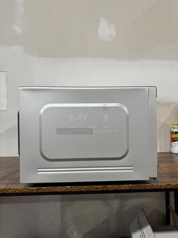 Brand New Scratch & Dent Sharp SMC2266HS
24 Inch Countertop Microwave Oven with 2.2 cu. ft. Capacity, 11 Power Levels, 1200 Watts Cooking Power, Silent Mode, Express Cook, Sensor Cook, Auto Defrost, Kitchen Timer and 12 Inch Removable Glass Turntable - Image 2 of 6