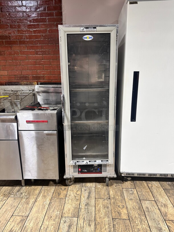 Late Model Cozoc HPC7011-WC9F9L DONUT, Full Size Heated Holding & Proofing Cabinet, 1 Clear Door, 16 Pan, 1.5 kW Working