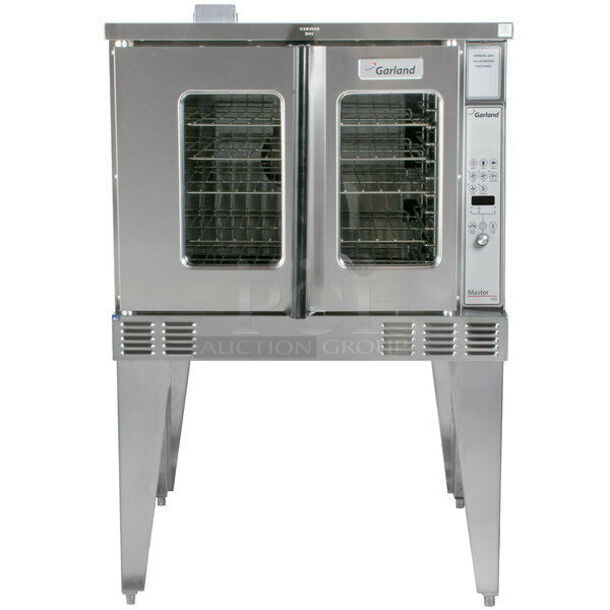 BRAND NEW! 2021 Garland Model MCO-GS-10 Stainless Steel Commercial Natural Gas Powered Full Size Convection Oven w/ view Through Doors, Metal Oven Racks and Thermostatic Controls. Stock Picture Used For Gallery. Does Not Include Legs. 60,000 BTU. 38x38x33