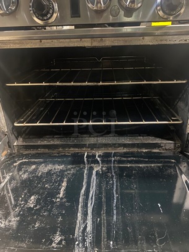 Southbend Commercial LP Powered 6 Burner Stove With Right Side Flat Griddle! Griddle Has Side Splashes! With Raised Back Splash And Salamander Shelf! With 2 Oven Underneath! Metal Oven Racks! All Stainless Steel! On Casters! - Image 6 of 11