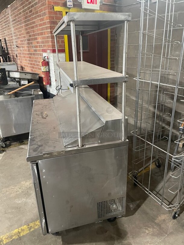 Nice! Turbo Air Stainless Steel Commercial Sandwich/Salad Refrigerated Prep Table! Eletric Powered! On Casters! With Double Over Head Shelf! MODEL TST-60SD 115V
 - Image 2 of 10
