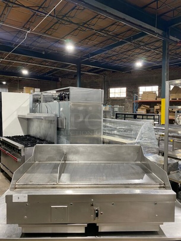 Woodstone Commercial Countertop Natural Gas Powered Flat Griddle! With Split Top! With Back & Side Splashes! All Stainless Steel! On Legs! Model: WSPL8364CT00NG SN: GP1826JUN1501852 - Image 1 of 10