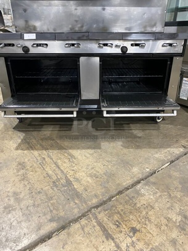 AMAZING FIND! Garland Natural Gas Powered 12 Burner Stove! With 2 Full-Sized Ovens! With Metal Oven Racks! With Raised Back Splash & Salamander Shelf! Stainless Steel! On Casters! WORKING WHEN REMOVED! - Image 7 of 11