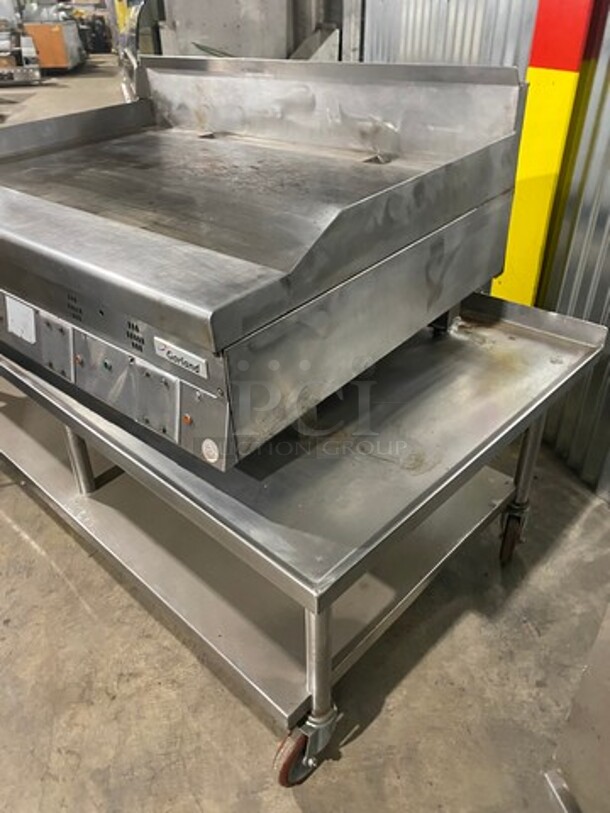 Garland Commercial Countertop Gas Powered Flat Griddle! With Back And Side Splashes! On Equipment Stand! With Storage Space Underneath! All Stainless Steel! On Casters! - Image 2 of 10