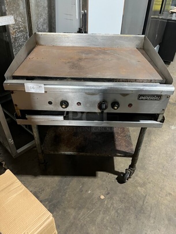 Imperial Commercial Countertop Natural Gas Powered Flat Top Griddle! With Back And Side Splashes! On Legs! On Equipment Stand! With Storage Space Underneath! All Stainless Steel! On Casters!